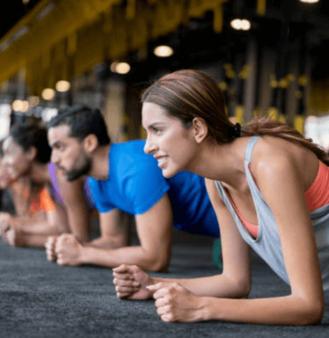 Gym members taking a class